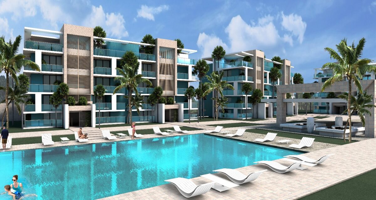 Render: bloques de apartamentos de Turquesa Bay vistos desde la piscina principal